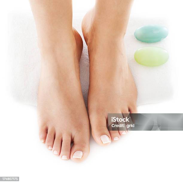 A Woman With Painted Toenails Exposes Her Feet At A Salon Stock Photo - Download Image Now