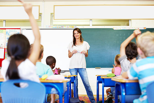 istock Raise your hand if you have a question 174807446