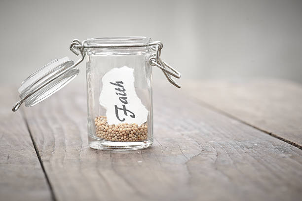 istock Mustard seeds in a jar signifying faith 174808097