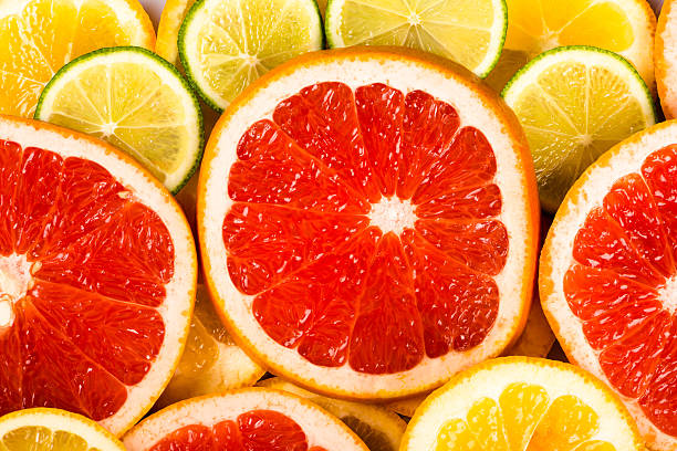 fundo de toranja - lemon textured peel portion - fotografias e filmes do acervo