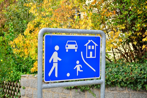 Traffic sign at the entrance of a residential area.