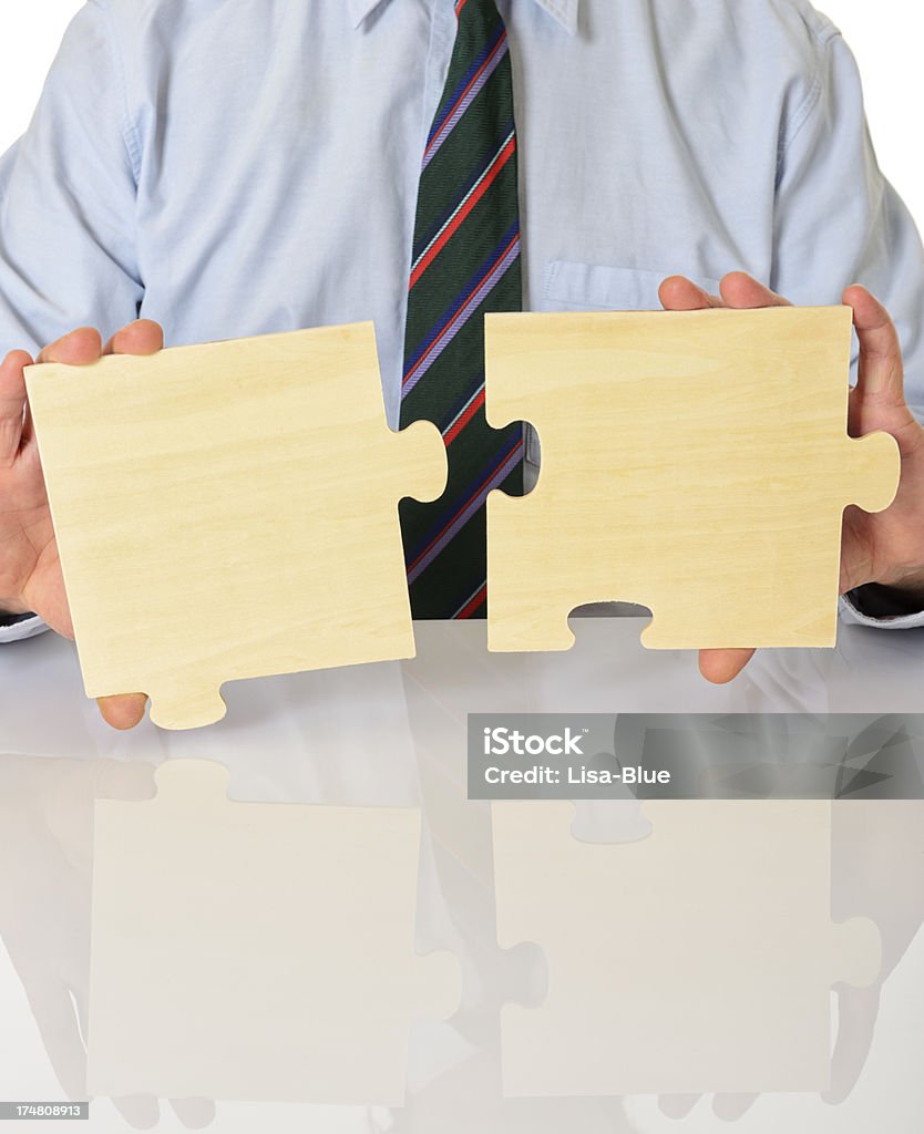 Empresario Puzzle concepto de trabajo en equipo - Foto de stock de Acuerdo libre de derechos