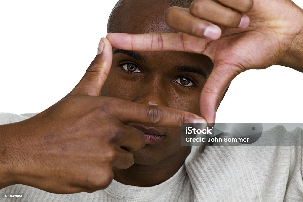 Man looking through hacer un marco con los dedos - Foto de stock de Hacer un marco con los dedos libre de derechos