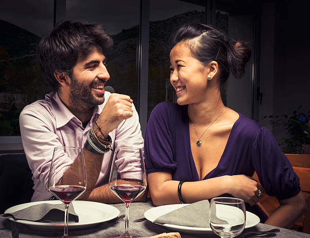 istock Couple smiling with red wine for St. Valentine 174809084
