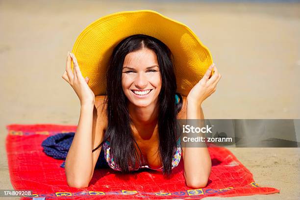 Beautiful Young Woman Relaxing On The Beach Stock Photo - Download Image Now - Adult, Adults Only, Beach