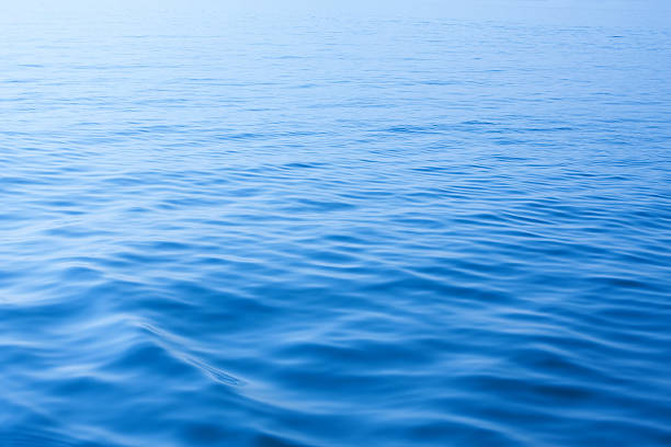 fondo de onda de agua de superficie - sea high angle view water tranquil scene fotografías e imágenes de stock