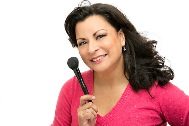 istock Happy mature makeup artist with a brush 174809489