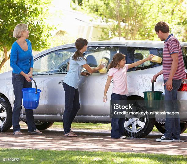 Family Washing Gray Minivan Together Stock Photo - Download Image Now - Car, Washing, Family