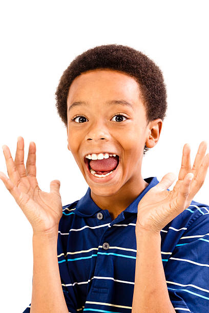 istock Elementary age 9-10 year old African Descent boy mouth open 174809760