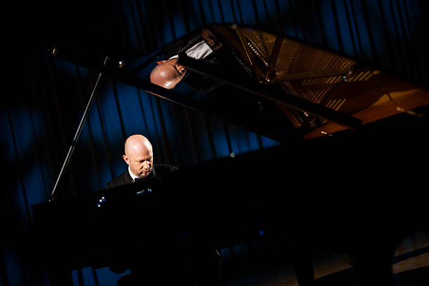 istock Pianist Playing The Grand Piano 174809886