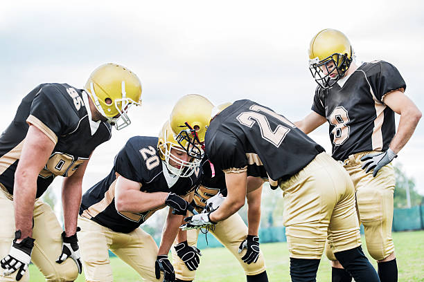 istock American football players making a plan. 174809893