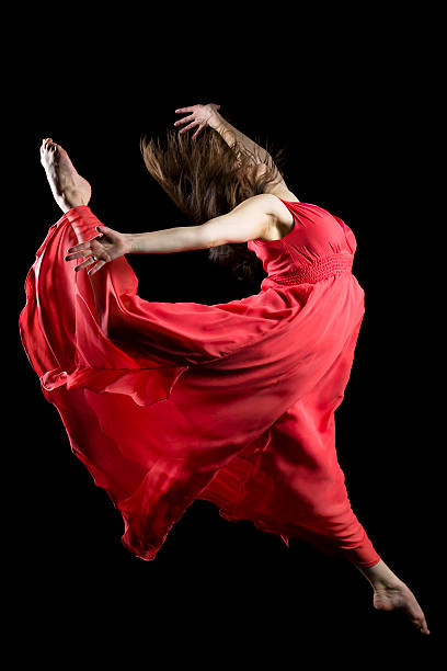 istock The dancer jump in front of black background 174810219
