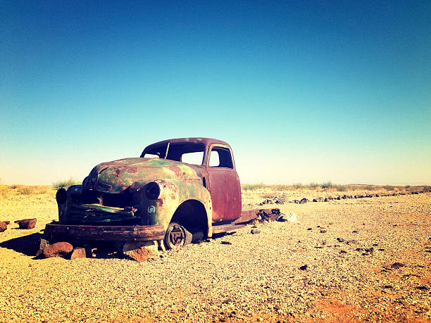 istock Old pick up truck left in desert 174810299