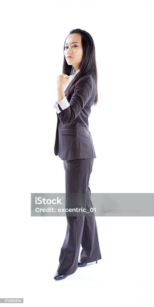 Attraente donna d'affari asiatici isolato su sfondo bianco - Foto stock royalty-free di Abbigliamento elegante