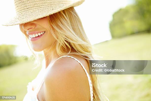 Protection Against Natures Elements Stock Photo - Download Image Now - Springtime, Sun Hat, One Woman Only