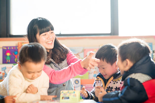 istock children and teacher in classroom 174811316