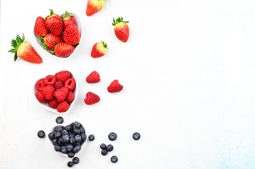 Various fresh berries. Summer berry flatlay.