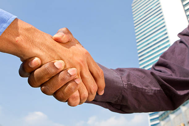 istock Business agreement with a handshake in a financial district 174811825