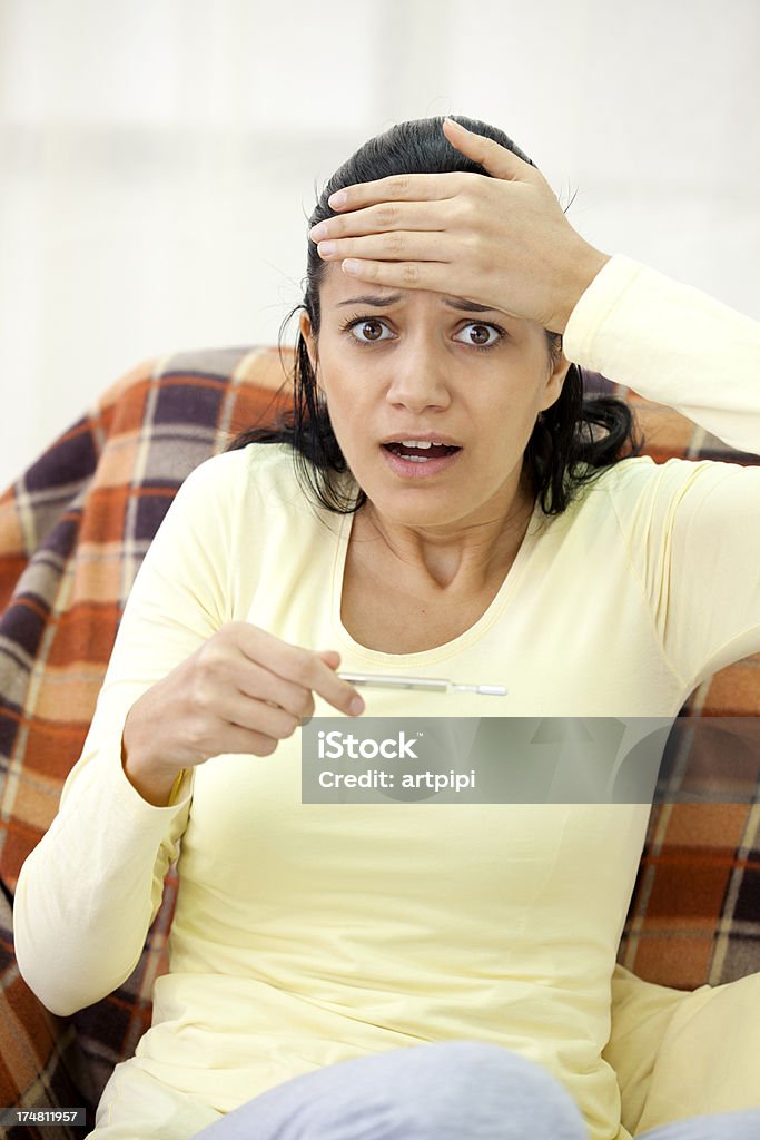 young sick woman young sick woman having high temperature 20-24 Years Stock Photo