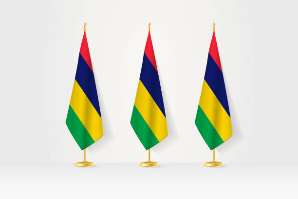 istock Three Mauritius flags in a row on a golden stand, illustration of press conference and other meetings. 1748121600