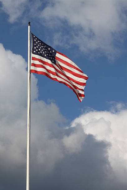 istock American Flag Waving On A Cloudy Day 174812191