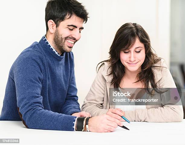 Couple Of Friends Studying With Tablet Stock Photo - Download Image Now - 20-29 Years, A Helping Hand, Adolescence