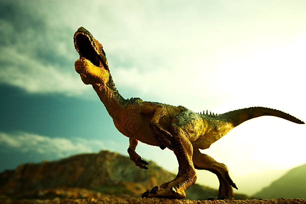 istock Roar of a dinosaur in the cloudy sky 174813664