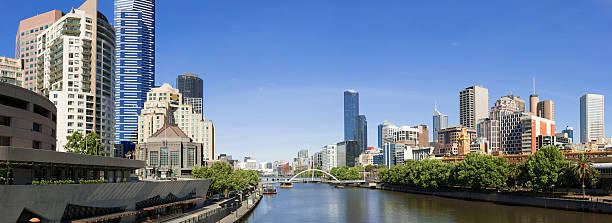 Melbourne City Skyline and Yarra River in Australia "Panoramic view of downtown Melbourne and the Yarra River, Australia" yarra river stock pictures, royalty-free photos & images