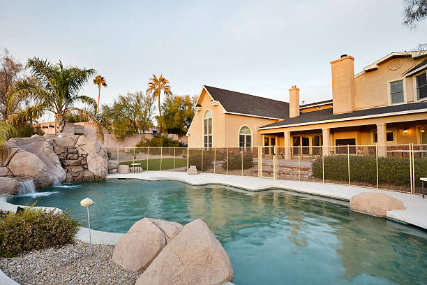 istock Backyard with rocks and swimming nag pool 174814021