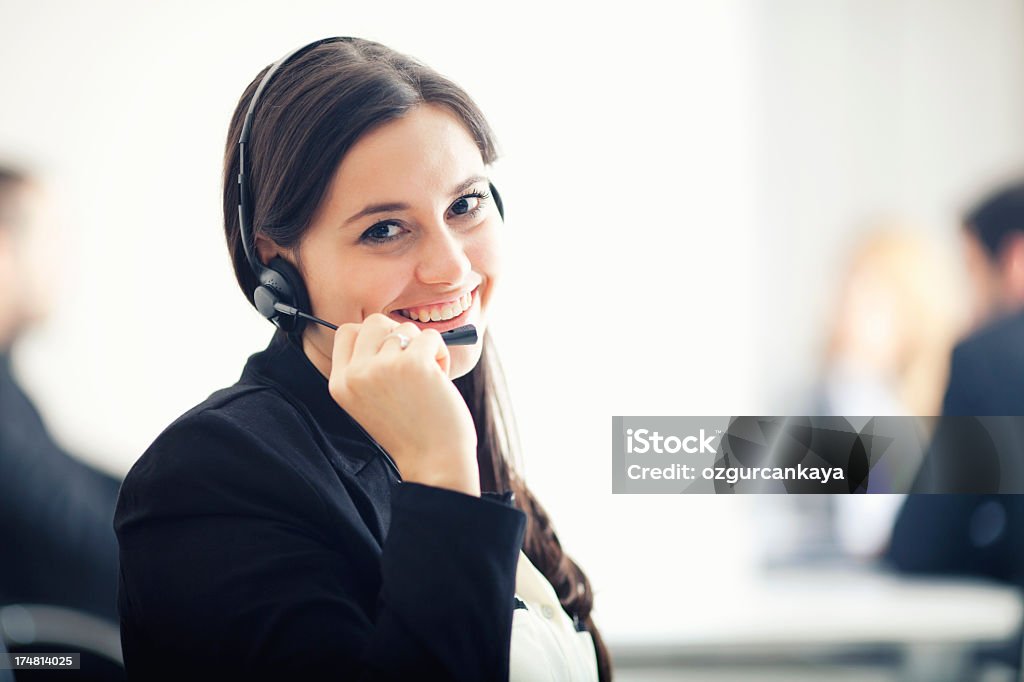 微笑む女性顧客サービス担当者 - 1人のロイヤリティフリーストックフォト