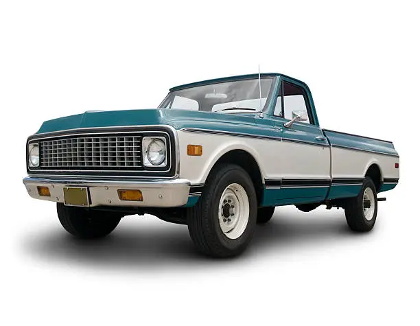 An old Chevrolet truck from the 1970's. All logos removed.Clipping path on vehicle.