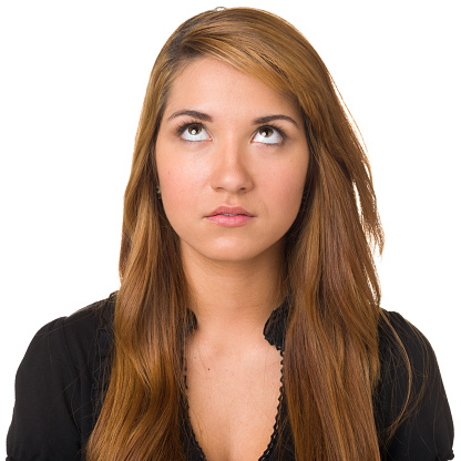 Portrait of a young woman on a white background.