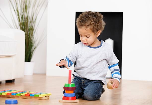 istock Toddler/ Little Boy Playing With Rings/ Stacker Toy 174814421