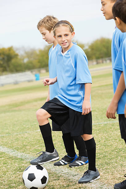 istock Young soccer players on sidelines of game 174814486