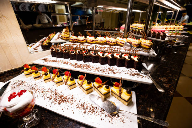 istock variety of sweets including cakes, eclairs and Turkish sweets, arranged beautifully on a table in a luxury all-inclusive hotel. perfect for use in food, travel and luxury related designs 1748149320