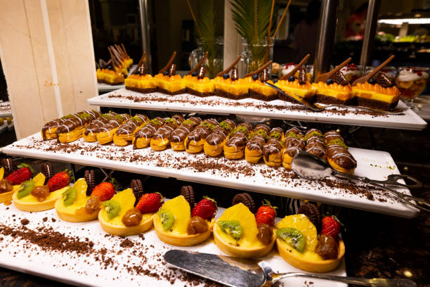 istock variety of sweets including cakes, eclairs and Turkish sweets, arranged beautifully on a table in a luxury all-inclusive hotel. perfect for use in food, travel and luxury related designs 1748149857