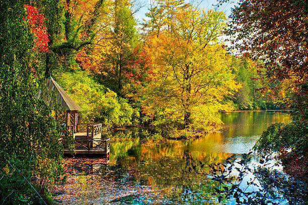 Boat house in the fall, Asheville, North Carolina, USA "Image taken in late October just off the Blue Ridge Parkway near Asheville, North Carolina, USA. Similar images:" blue ridge parkway stock pictures, royalty-free photos & images