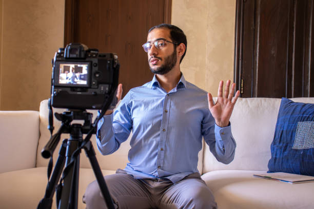 istock Young arabic man conducting a seminar from home 1748156049