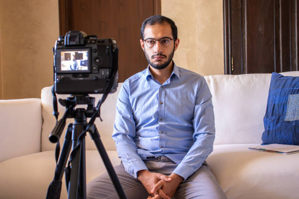 istock Young arabic man conducting a seminar from home 1748157091