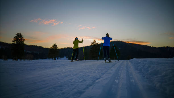 istock Two women skiing on snowy mountain slope 1748161495