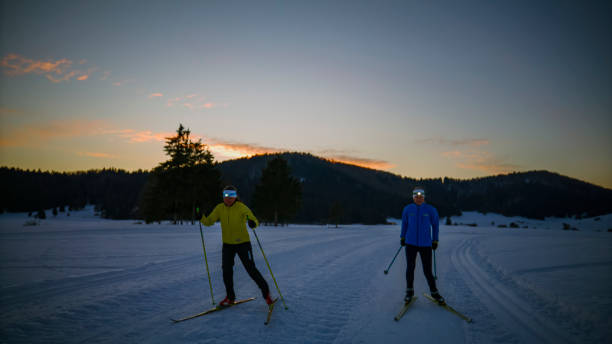 istock Two women skiing on snowy mountain slope 1748163239