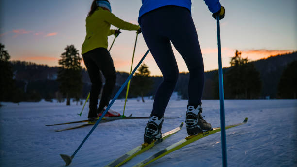 istock Two women skiing on snowy mountain slope 1748163241