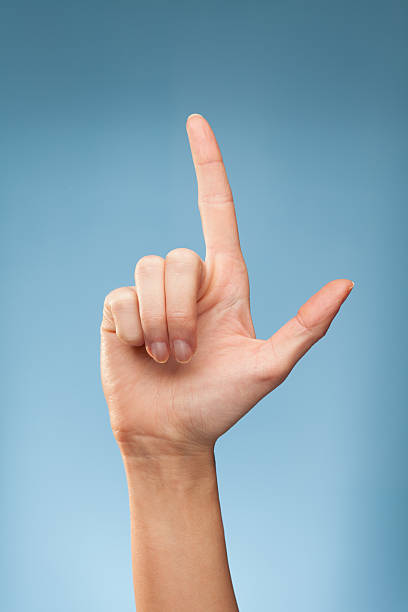 lenguaje de signos-l - letter l human hand human finger human thumb fotografías e imágenes de stock