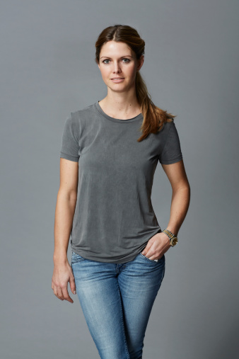 Portrait of mid adult woman in grey t-shirt