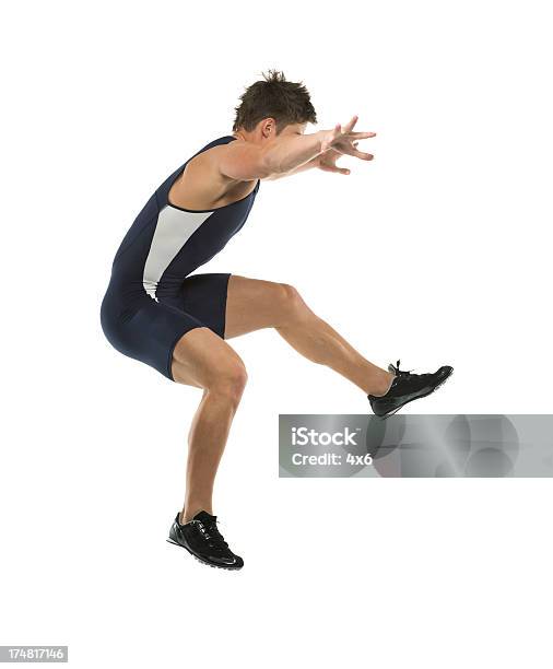 Male Wrestler Jumping Stock Photo - Download Image Now - 20-29 Years, Activity, Adult
