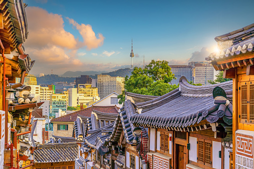 Old Seoul buildings with modern cityscape on the background