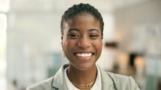 Face, business and smile of black woman in office, corporate workplace and company. Portrait, happy and professional African lawyer, attorney and female worker in Nigeria for consultant career or job