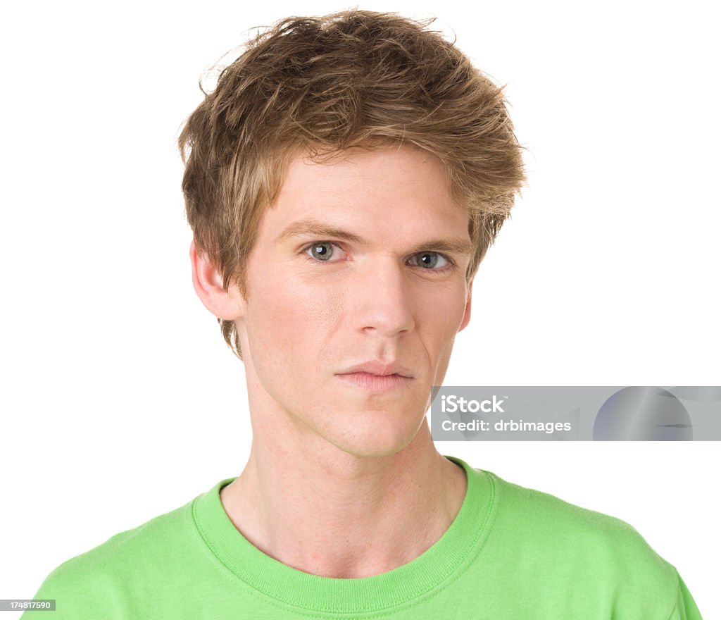 Serious Young Man Headshot Portrait Portrait of a young man on a white background. 20-29 Years Stock Photo