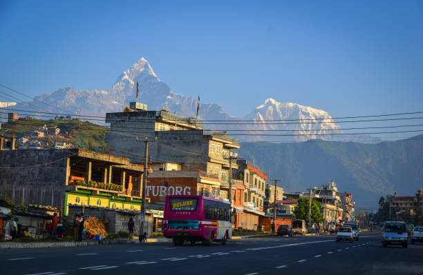 Pokhara, Nepal - Oct 20, 2017. Mountain township at sunny day in Pokhara, Nepal. Pokhara is the starting point for most of the treks in the Annapurna area.