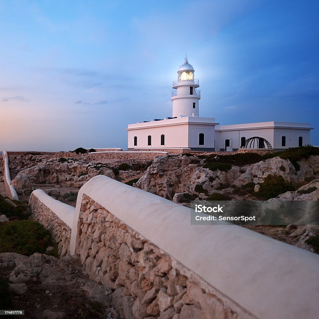 Lighthouse in Menorca Mediterranean lighthouse in Menorca. Far de Cavalleria. Balearic Islands Stock Photo